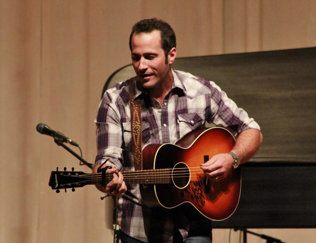Community Effort: Joshua Davis plans to enter an East Lansing recording studio in August. (Photo/Anna Sink)