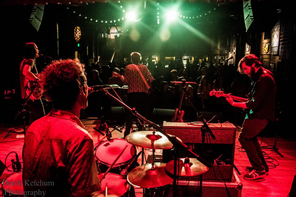 In the Spotlight: Bands often fire up fans but how much are devotees willing to pay for that entertainment? (Photo/Derek Ketchum)
