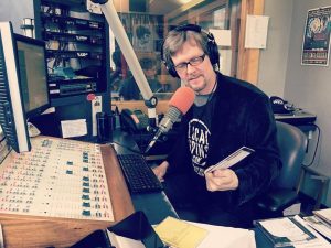 Sinkevics on the air at WYCE. (Photo/Anna Sink)