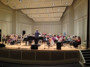 Chris Hansen directed a very big band at St. Cecilia during the showcase.