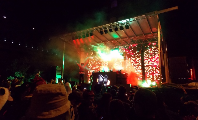 Pre-Halloween Revelry: Thousands of costumed partyers flooded Halloween on Ionia for a night of electronic dance music. (Photo/Local Spins)