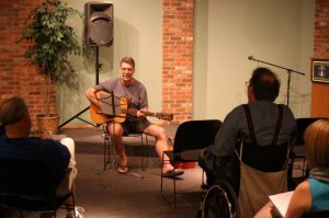 Jeff Oxford testing a song during a GRSA gathering at Schuler Books. 