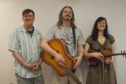 Fellowship and a Good Cause: Buses by the Beach co-founder Brien Dews, left, with Nicholas Thomasma and Clouds. (Photo/Tori Thomas)