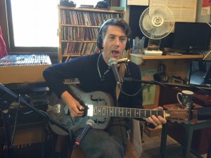 On the Air: Luke Winslow King in the studios of WYCE for Local Spins on WYCE. (Photo/John Sinkevics)