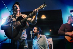 Collaborative Fellow: Max Lockwood with Dan Rickabus on state at SpeakEZ Lounge. (Photo/Anna Sink)