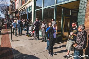 Early Risers: Folks lined up early outside Vertigo Music. (Photo/Anthony Norkus)