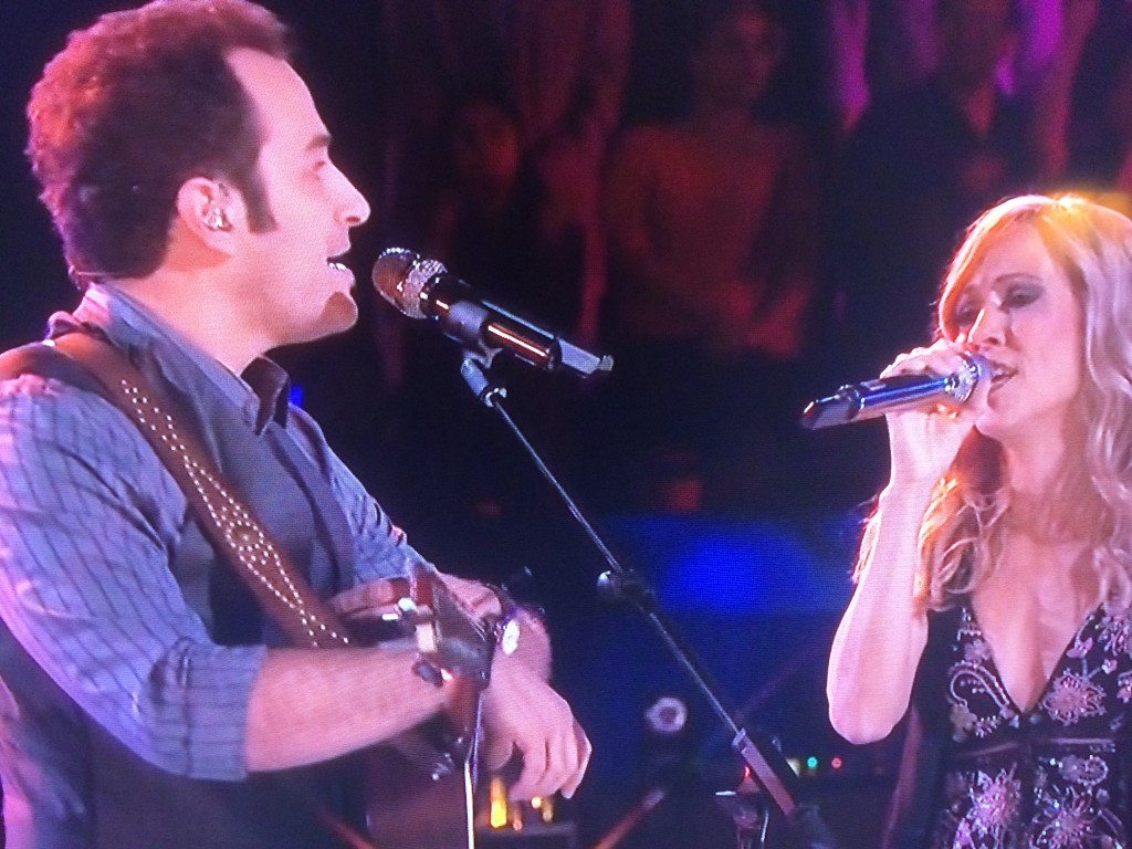 Davis performing with Sheryl Crow on Tuesday night. 