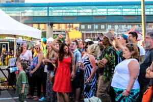 Party Crowd: By early evening, Local First Street Party was hopping on Saturday. (Photo/Taylor Mansen)