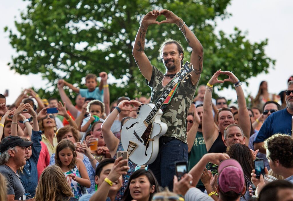 All Heart: Crowd Fave: Michael Franti rubbed elbows, literally, with his fans all night long at Meijer Gardens. (Photo/Chris Clark)