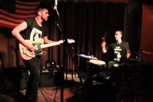 Blazing Hot: Jesse Ray & The Carolina Catfish even set cymbals on fire with their flaming show at Tip Top Deluxe. (Photo/Anna Sink)