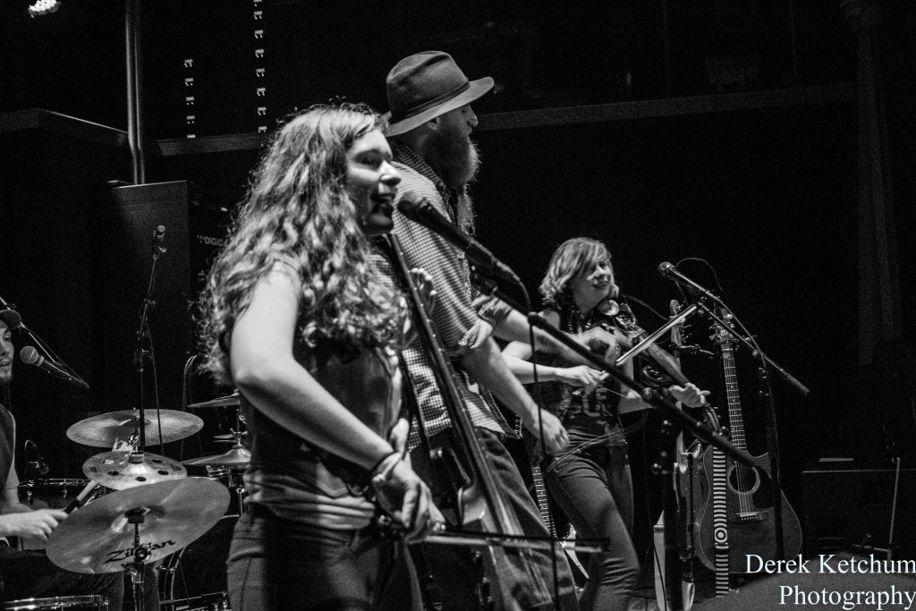 Unique Partnerships: Hip hop's Rick Chyme on stage with The Accidentals at Bell's Brewery in Kalamazoo. (Photo/Derek Ketchum)