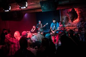 Multi-Genre Lineups: Ghost Bunnies are shown performing at a recent Louie's show. (Photo/Derek Ketchum)