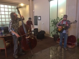 Banking On It: Max Lockwood, Daine Hammerle and Nate Wagner of Big Dudee Roo performing Wednesday morning in a Grand Rapids bank.