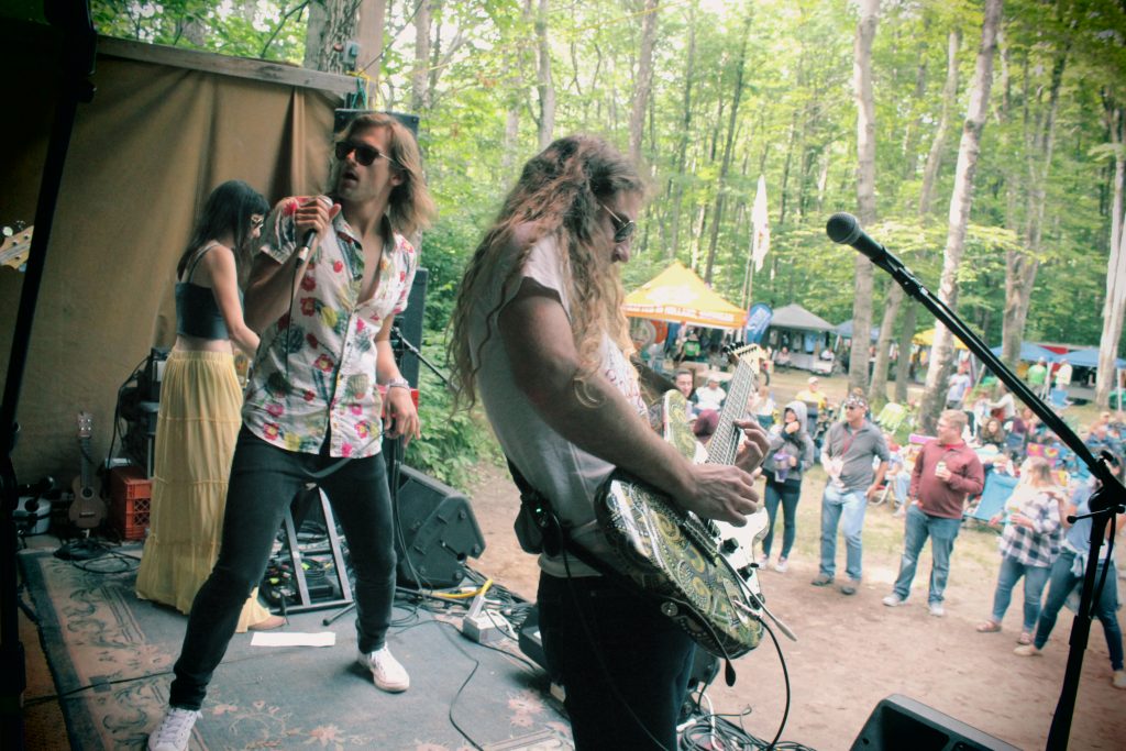 Rock in the Woods: The Outer Vibe on stage during the Beaver Island Music Festival. (Photo/Anna Sink)