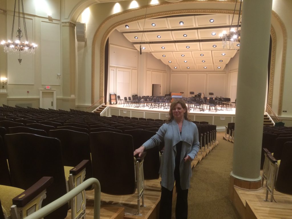 Renovations that Touched All of the Building: Cathy Holbrook in Royce Auditorium. (Photo/Local Spins)