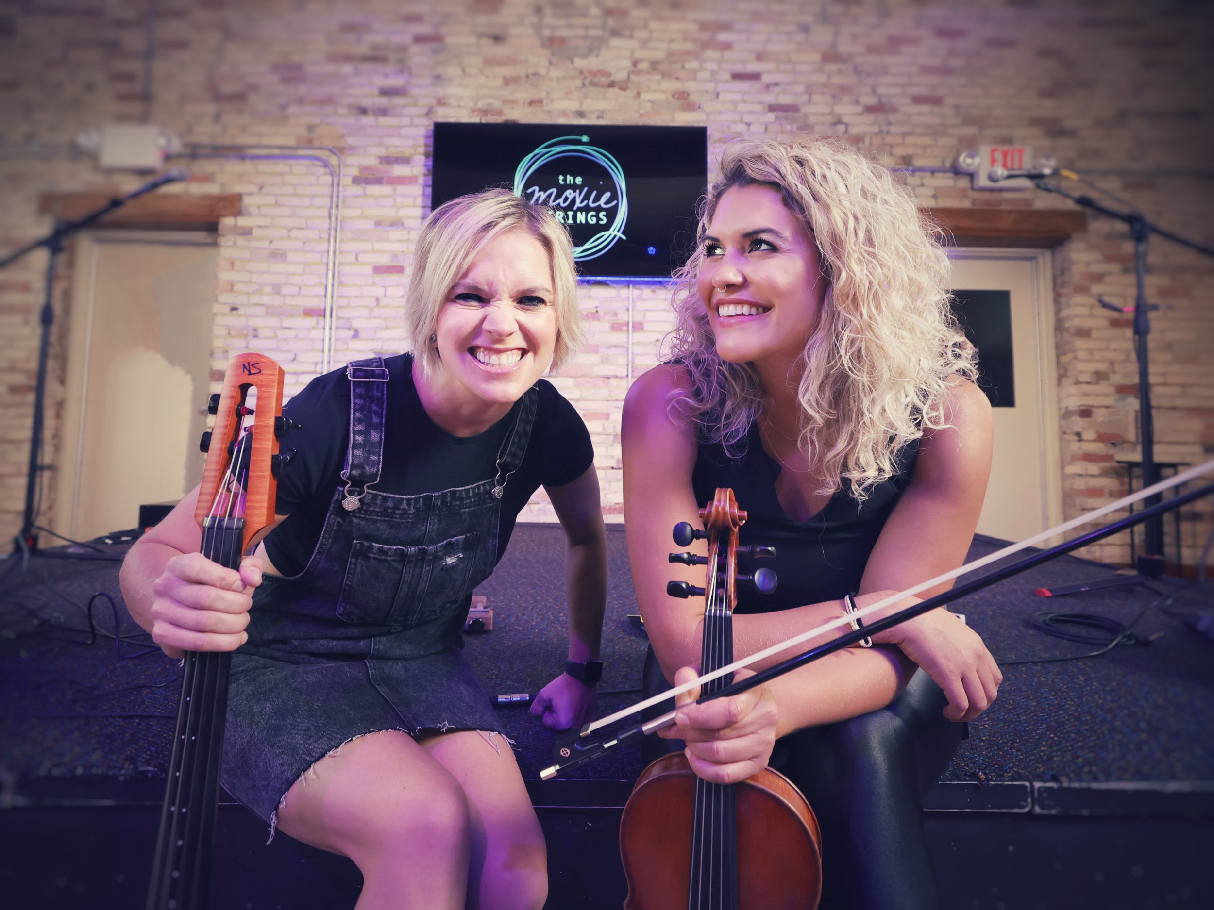 Moxie Strings closing 17year run as highenergy string duo Local Spins