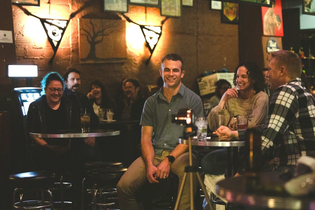 Local Grins: The Pyramid Scheme’s ‘High Score Comedy,’ Human Comedians vs. AI and more